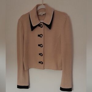 St. John Cardigan like new very classy. Can be dressed up or worn with jeans.